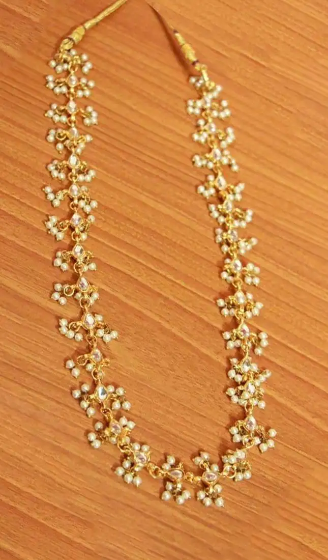 White pearl and kundan studded yellow gold wedding necklace