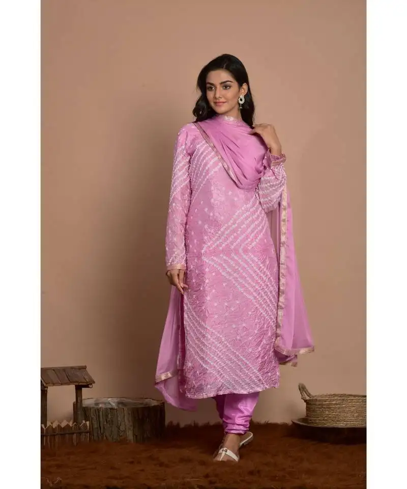 Lavender kurta with churidar and dupatta
