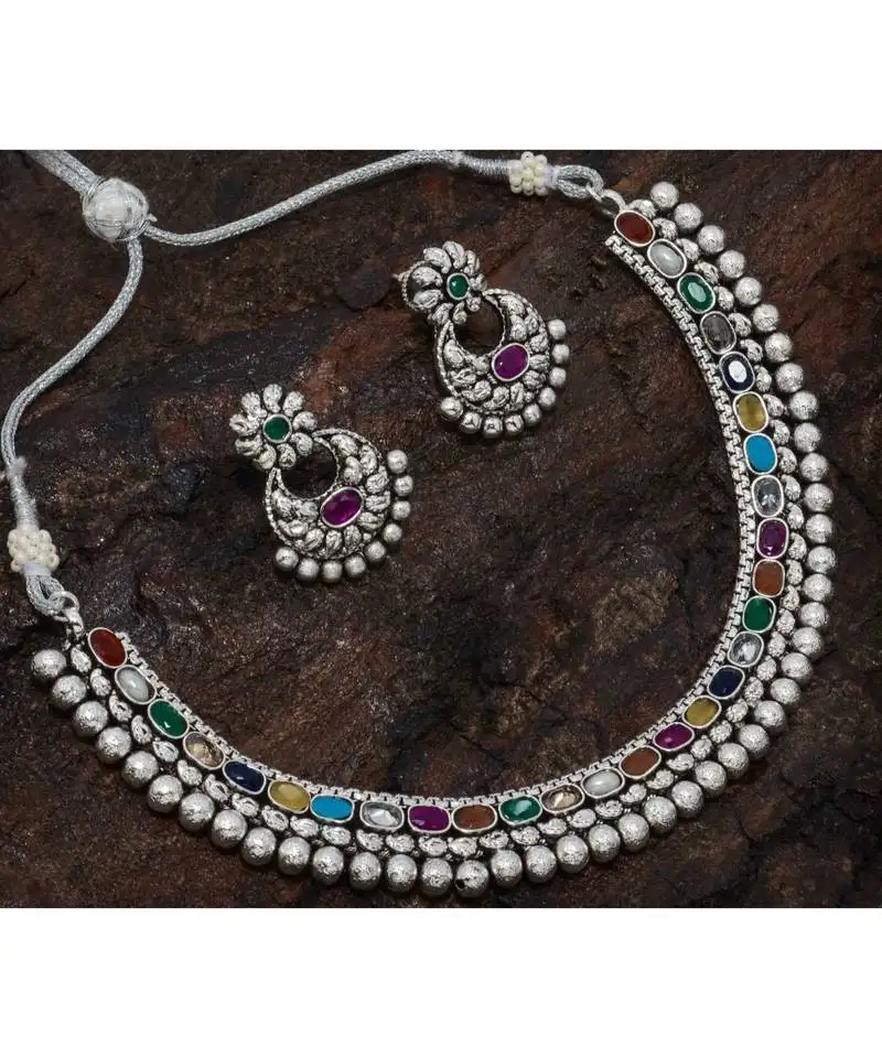 Silver necklace set with kundans