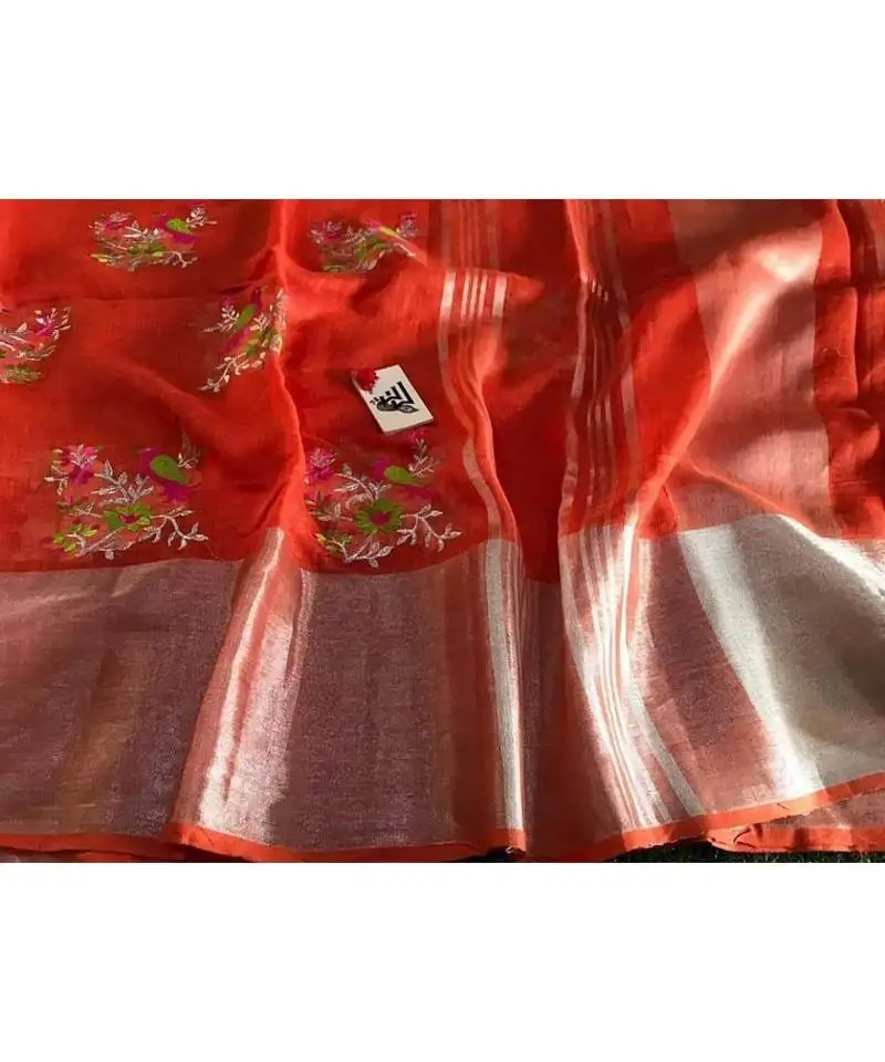 Red handcrafted linen saree with embroidery work on the saree