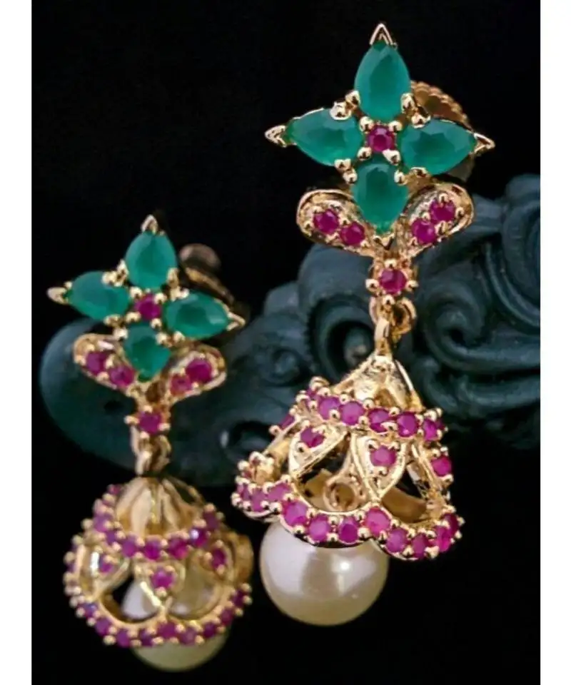 Pink stones and embroled jhumkas