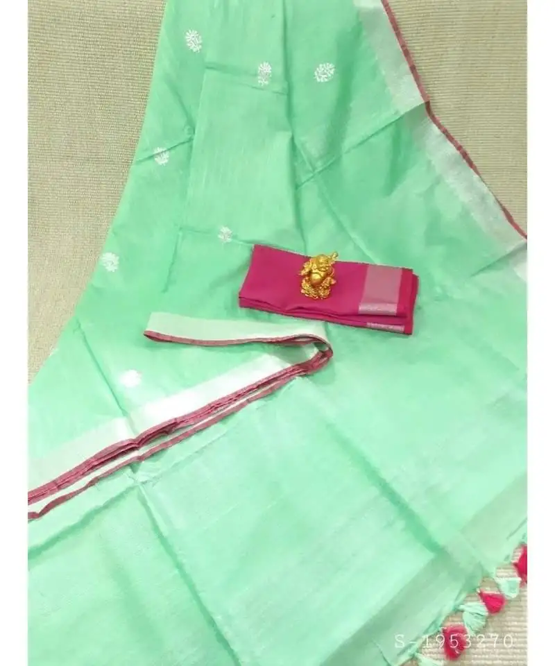 LightGreen handcrafted linen saree with small flower embroiderywork