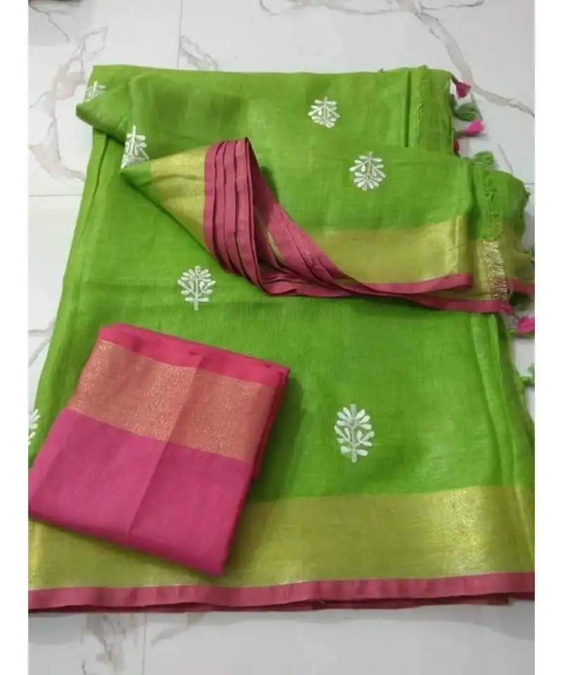 Green handcrafted linen saree with small flower embroidery work