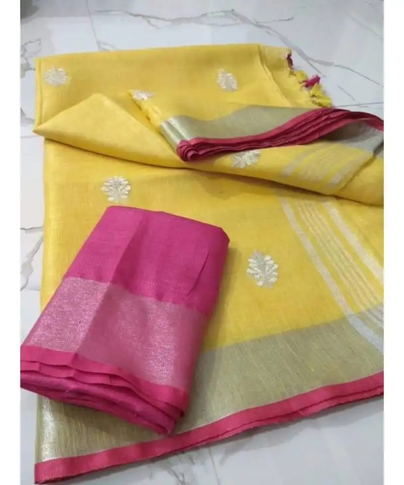 Yellow handcrafted linen saree with small flower embroidery work