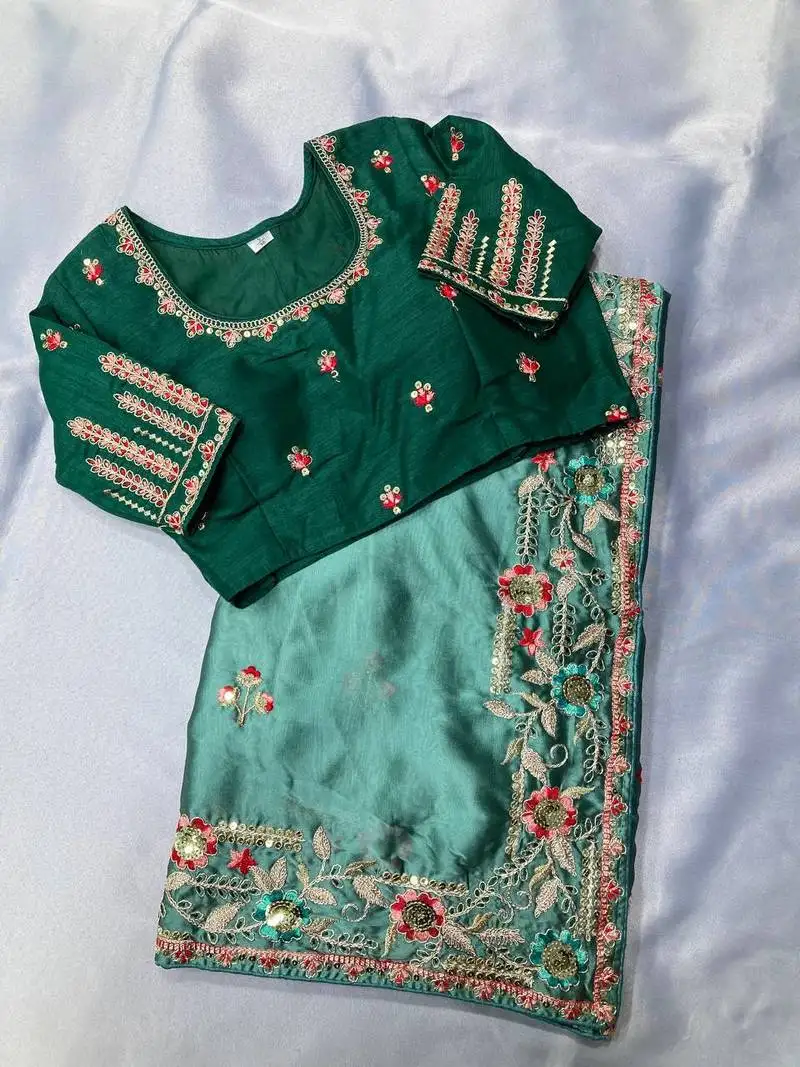 Sky party wear rangoli art silk saree