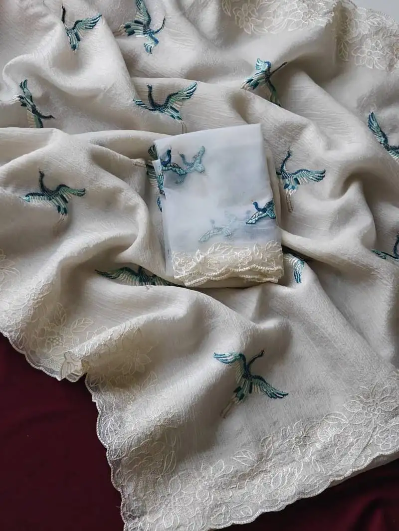 White crush fabric saree with lucknowi embraided border with butterfly embroidery