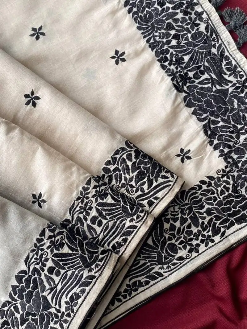 White loom tussar saree with all over single tone designer embroidery pattern