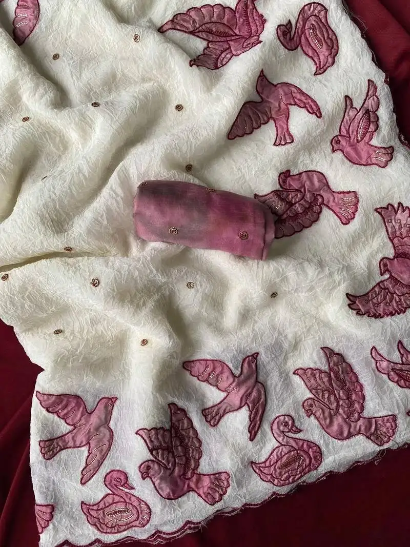 White crushed fabric saree with beautiful applique pattern panel of bird design