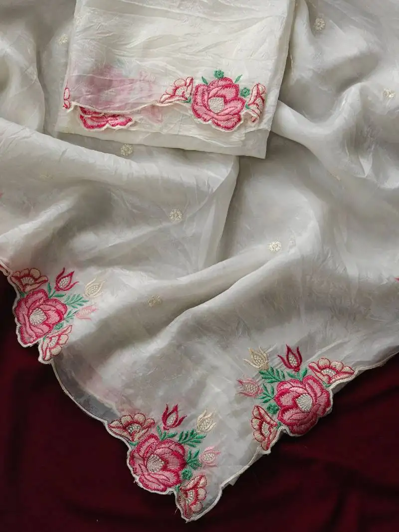 White crush silk blend saree with all over embroidery design and cut work design