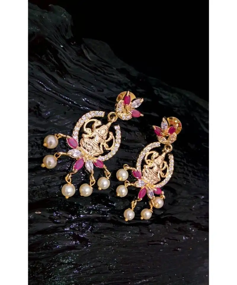 And ruby with laxmi dangler drops