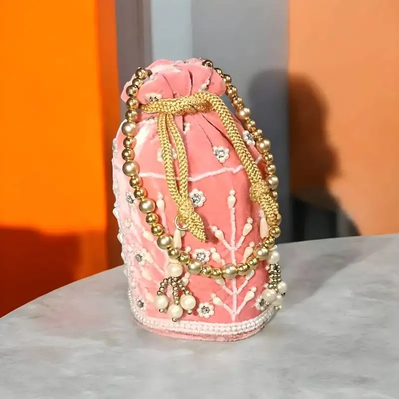 Light pink velvet embroidered potli – bridal & festive special