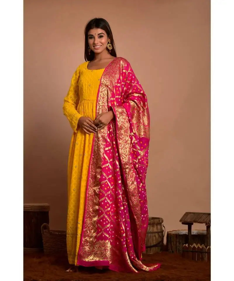Yellow chikankari gathered anarkali with peach dupatta