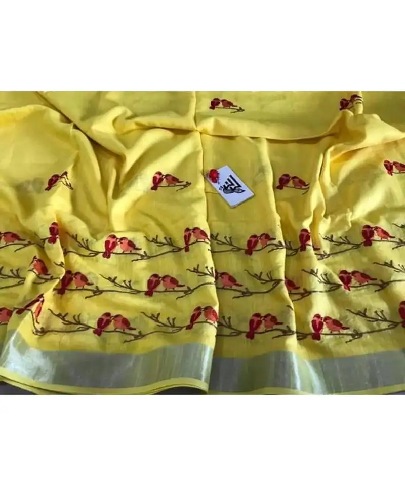 Yellow handcrafted linen saree with embroidery work on the saree