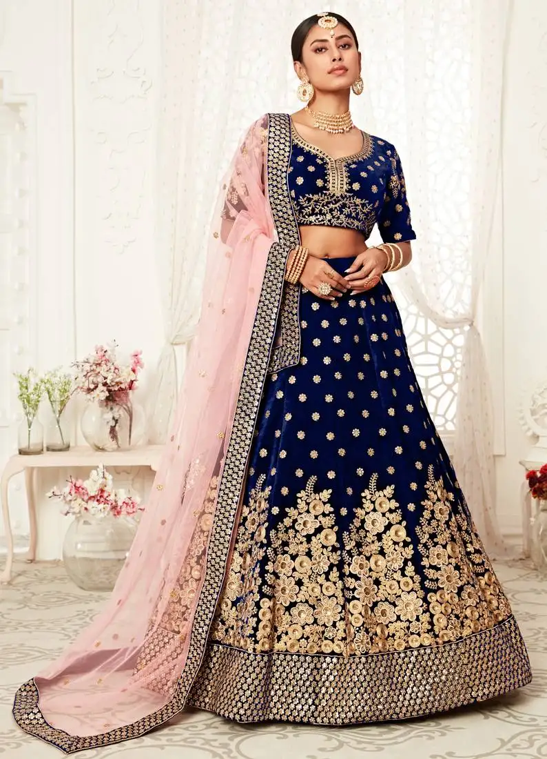 Alluring navy-blue zari sequins and thread embroidered velvet lehenga choli for bridal