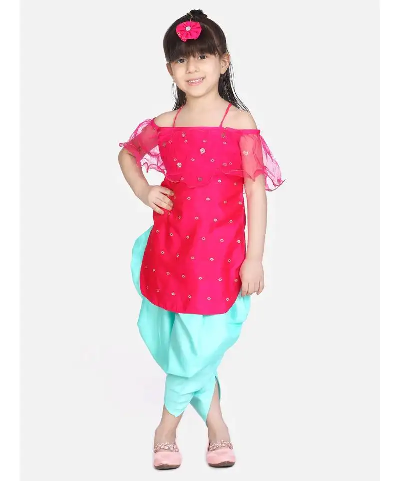 Rani pink frilly fusion kurti dhoti with matching maang tika