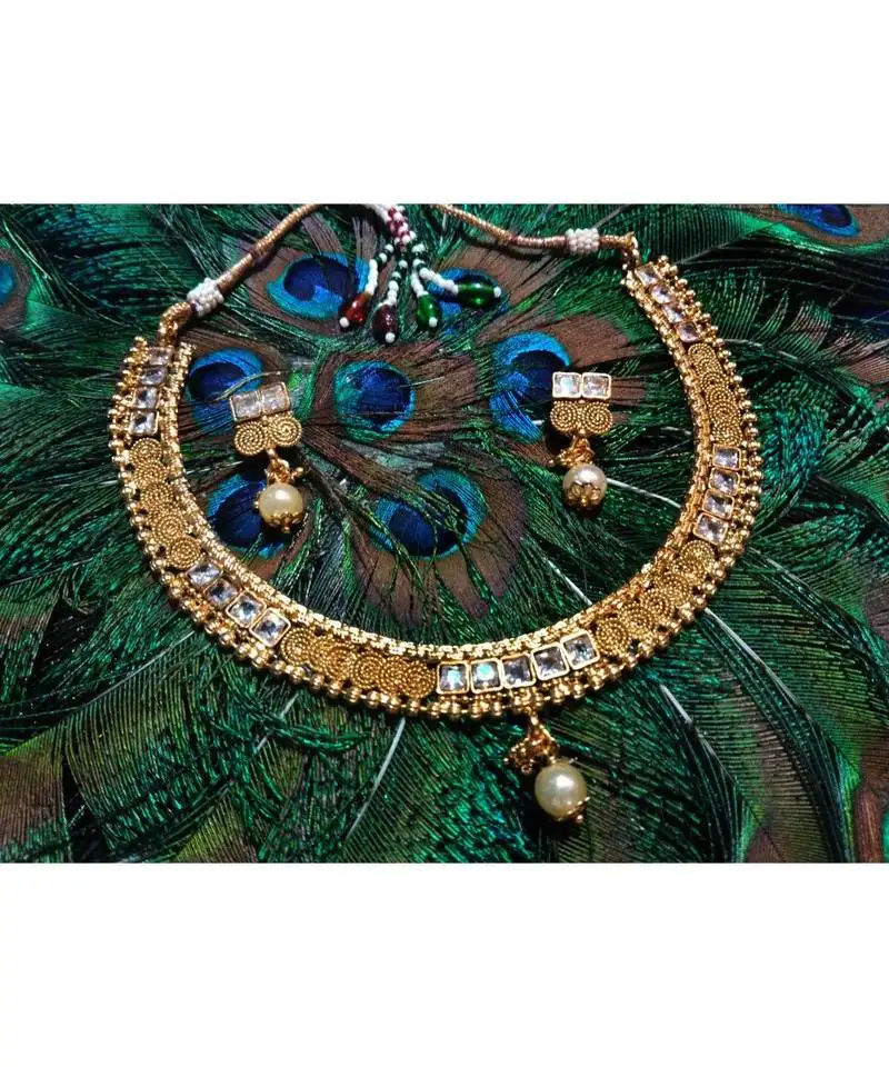 Georgeous gold plated white stones necklace set