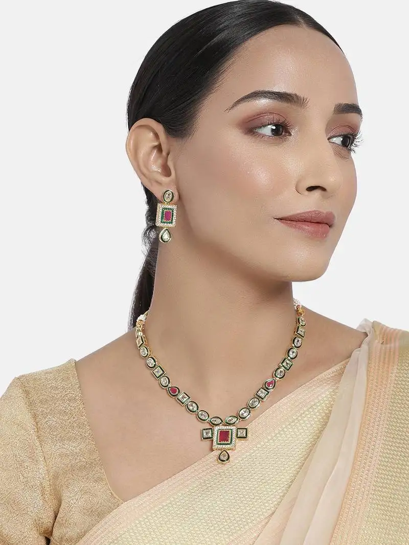 Traditional handcrafted beaded ruby jewellery set glided with uncut polki kundans for women