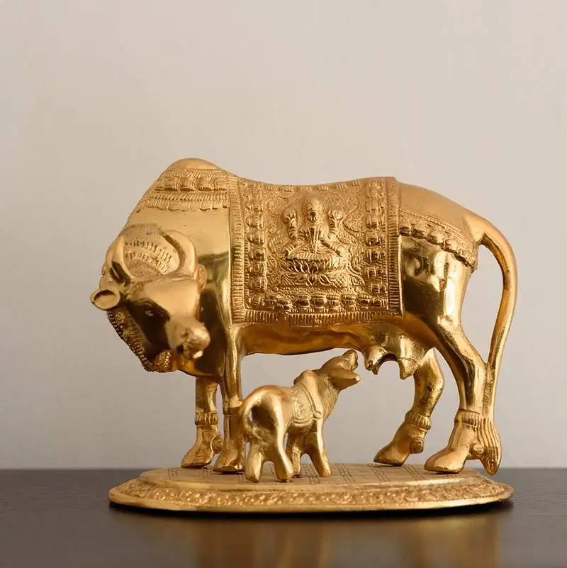 Golden kamdhenu cow and calf metal figurine