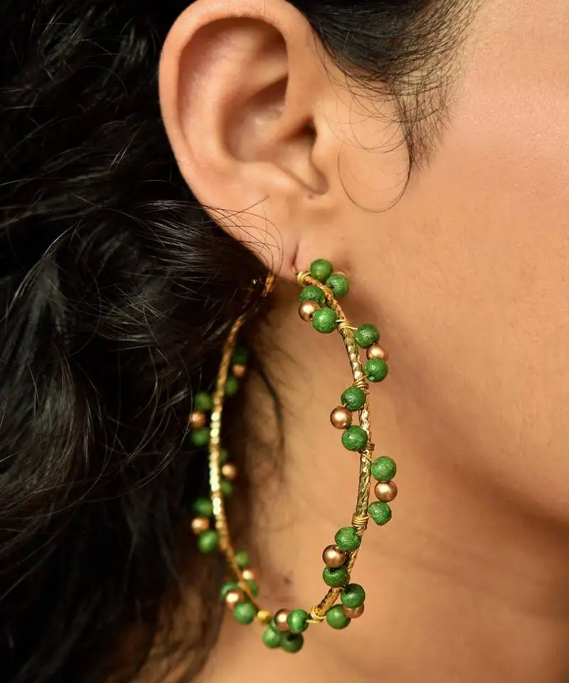 Green arch hoops earrings