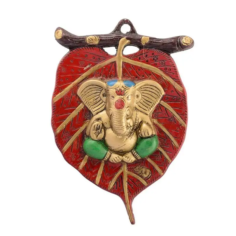 Lord ganesha in green dhoti on red leaf wall hanging