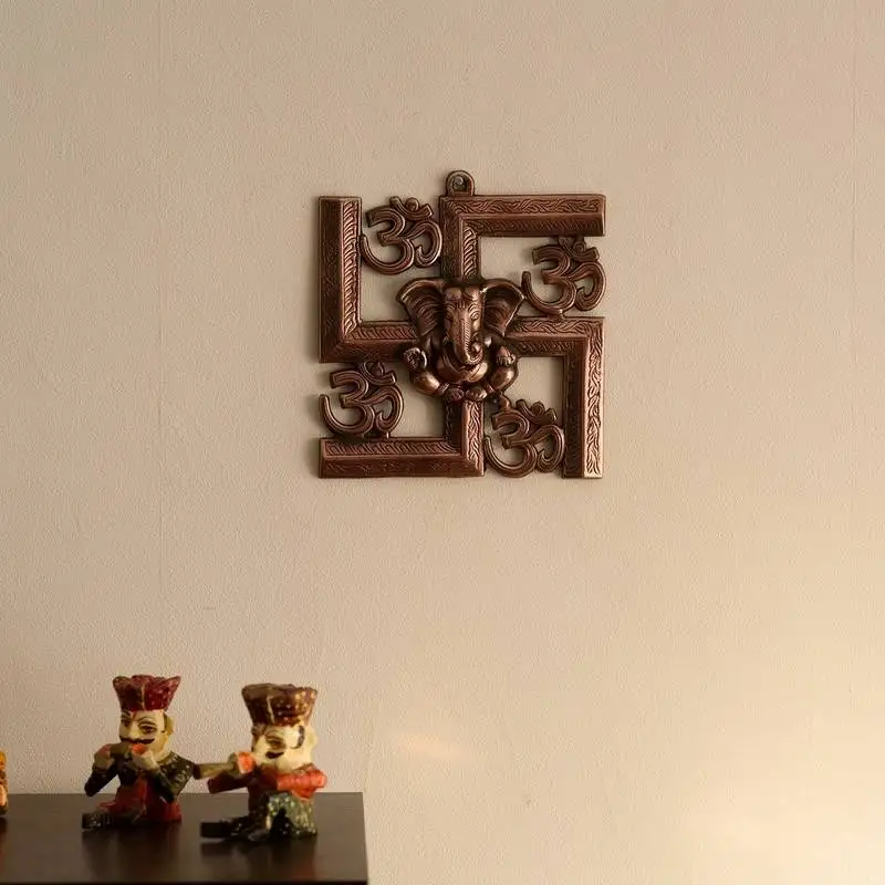 Lord ganesha on om swastik metal wall hanging