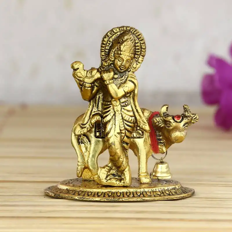 Lord krishna playing flute with golden cow showpiece