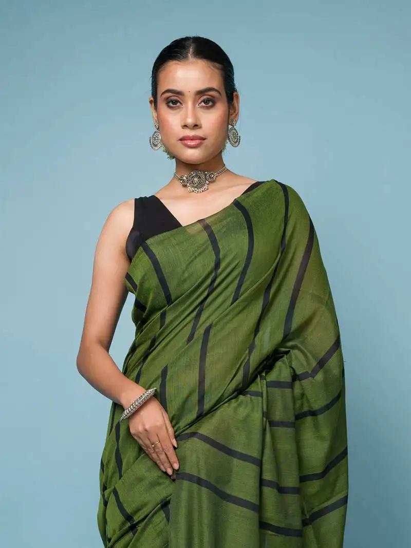 Bottle green cotton handloom saree with thin black stripes