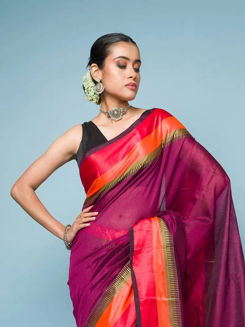 Magenta colour saree with red, orange and golden border