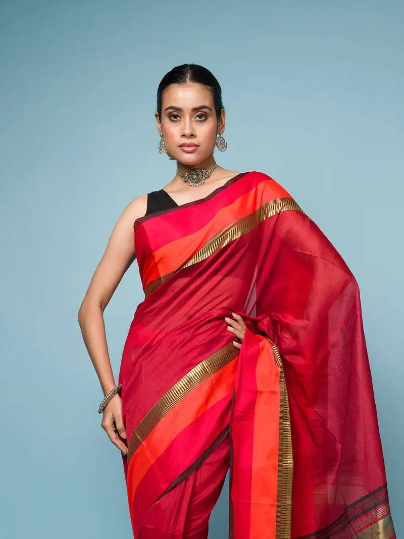 Red cotton blended saree with red, orange and golden border