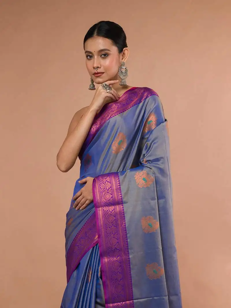 Sky blue blended silk saree with broad purple border