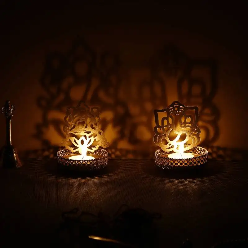 Lord ganesha and laxmi shadow tea light holder