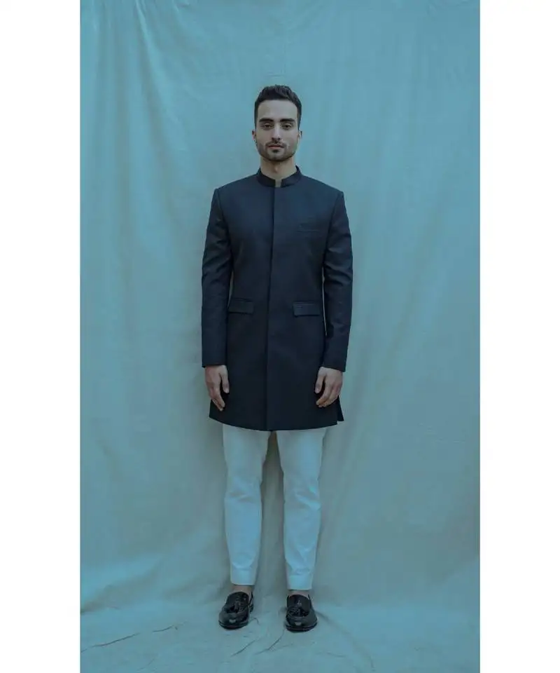 Blue textured achkan with white kurta and white pants