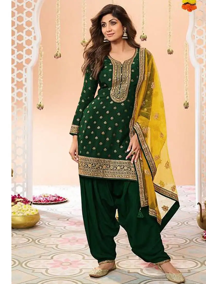 Latest green silk patial suit with contrast dupatta for women semi stitched