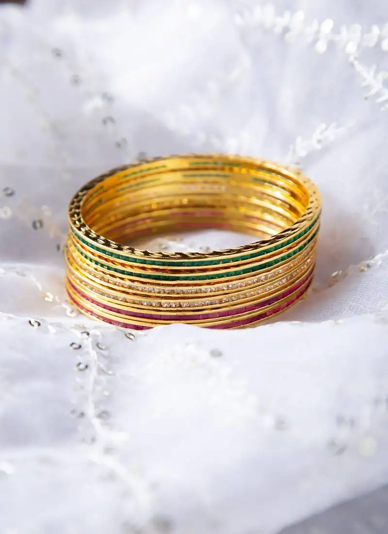 Beautiful cz ad studded gold plated traditional red green white american diamond bangles set for women