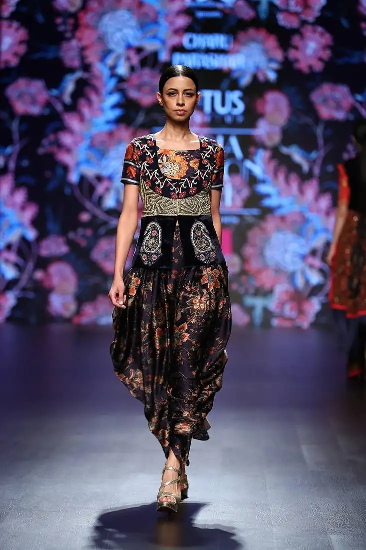 Navy blue printed top with printed flare style dhoti and and hand embellished jacket