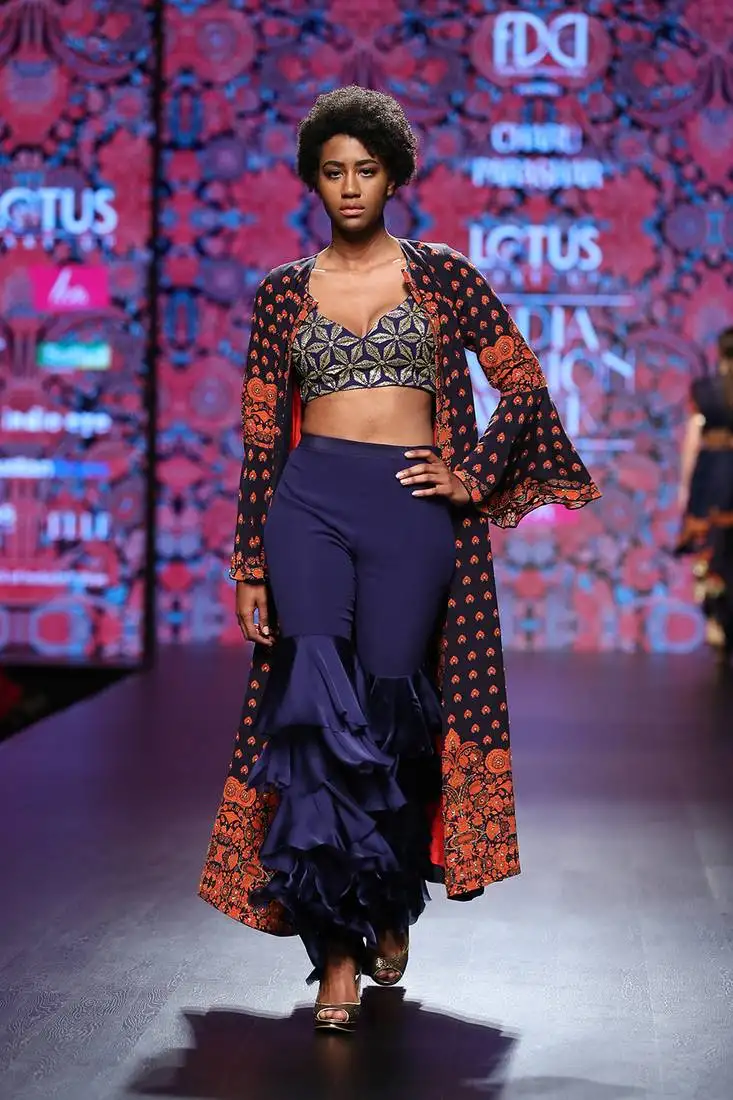 Navy blue printed front open long cape with hand embellished blouse and flare pants