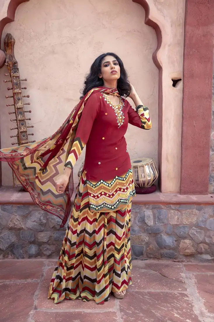 Red printed kurta with printed sharara and dupatta