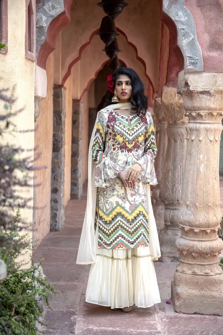 Cream printed kurta with sharara and dupatta