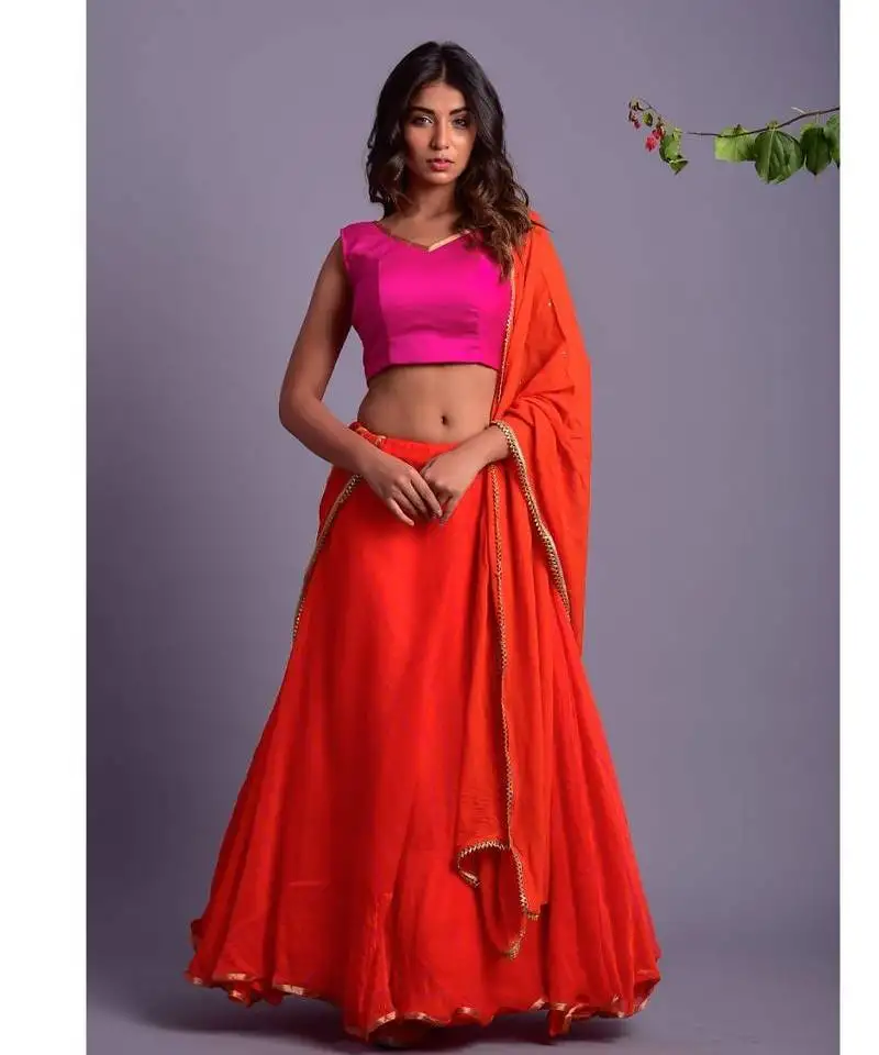 Orange leheriya lehenga set with magenta blouse