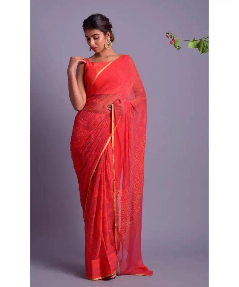 Orange printed bandhej chiffon saree with blouse