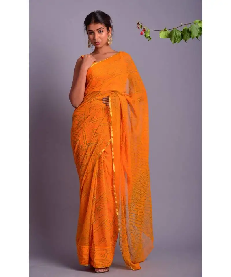 Yellow printed bandhej chiffon saree with blouse