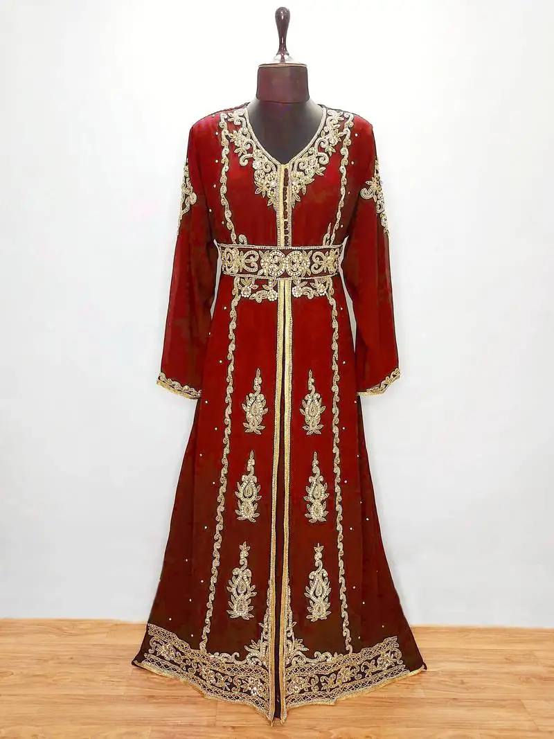 Maroon luxurious moroccan kaftan with sun-proof hijab.