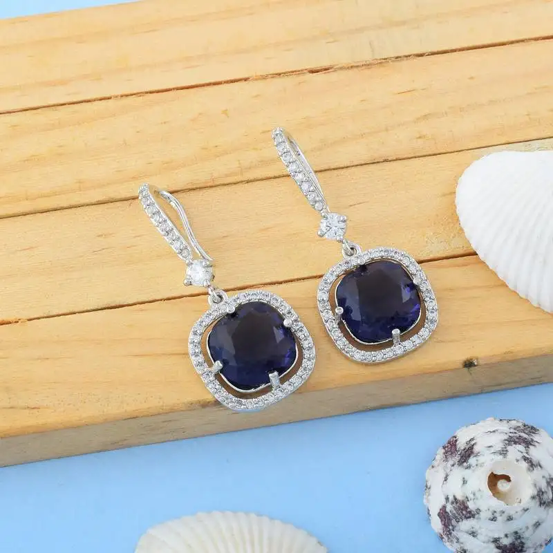 Purple color american diamond earrings