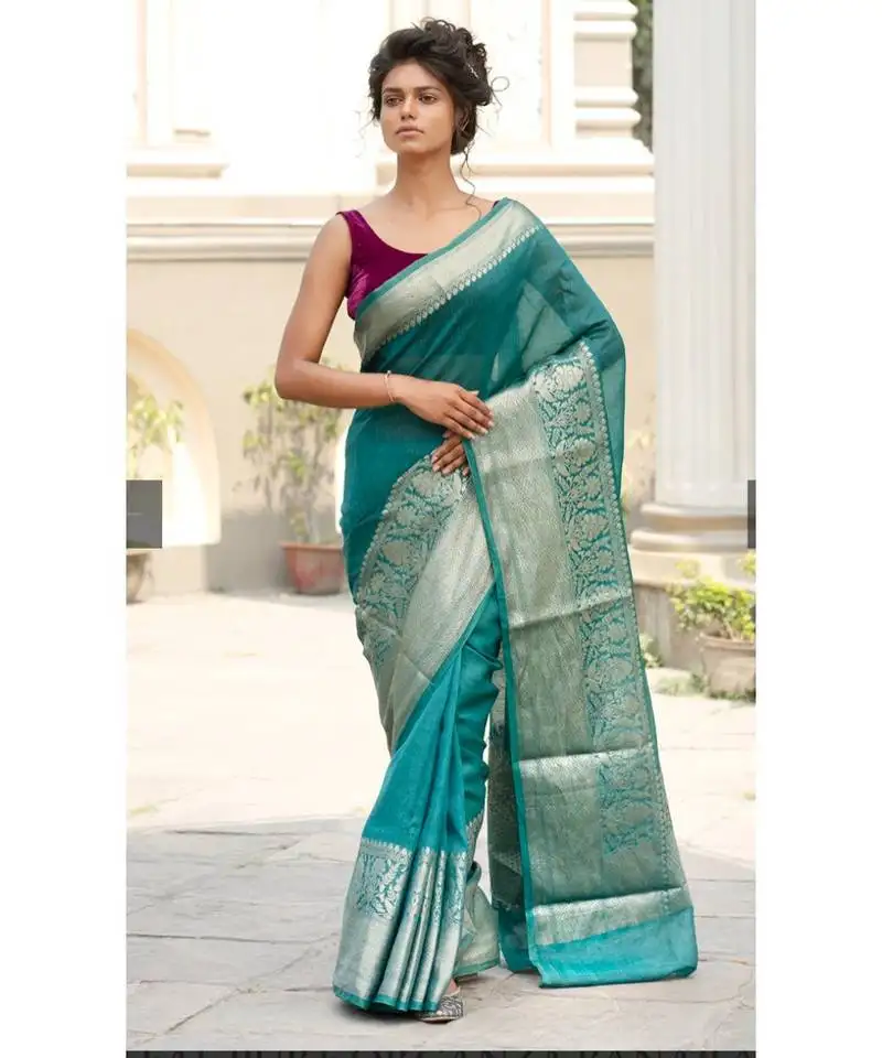 Green banarsi linen saree with blouse piece