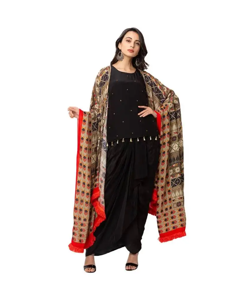 Black top and draped skirt with printed kaftan style jacket