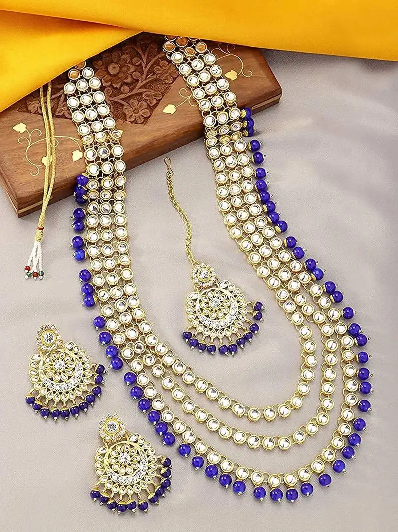 Traditional kundan & pearl studed bridal jewellery set for women