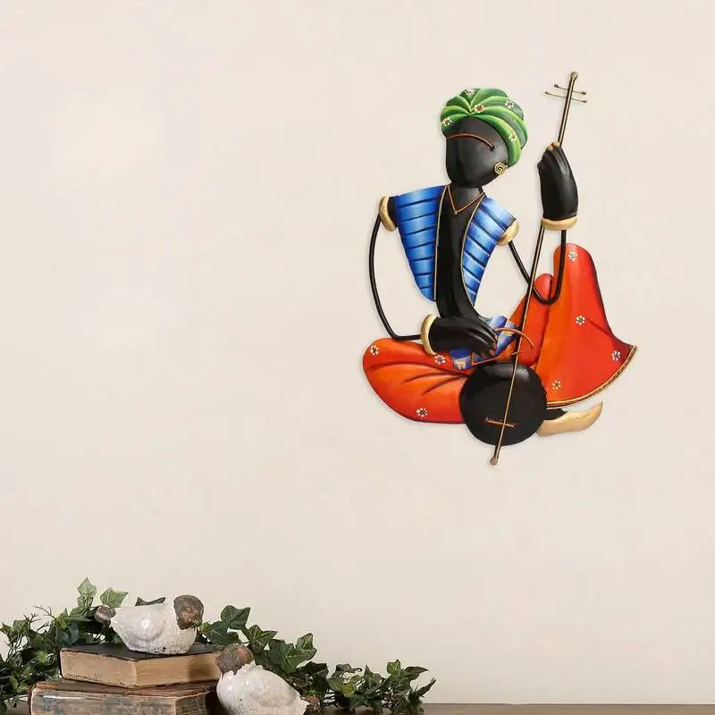 Musician tribal man playing veena wall hanging