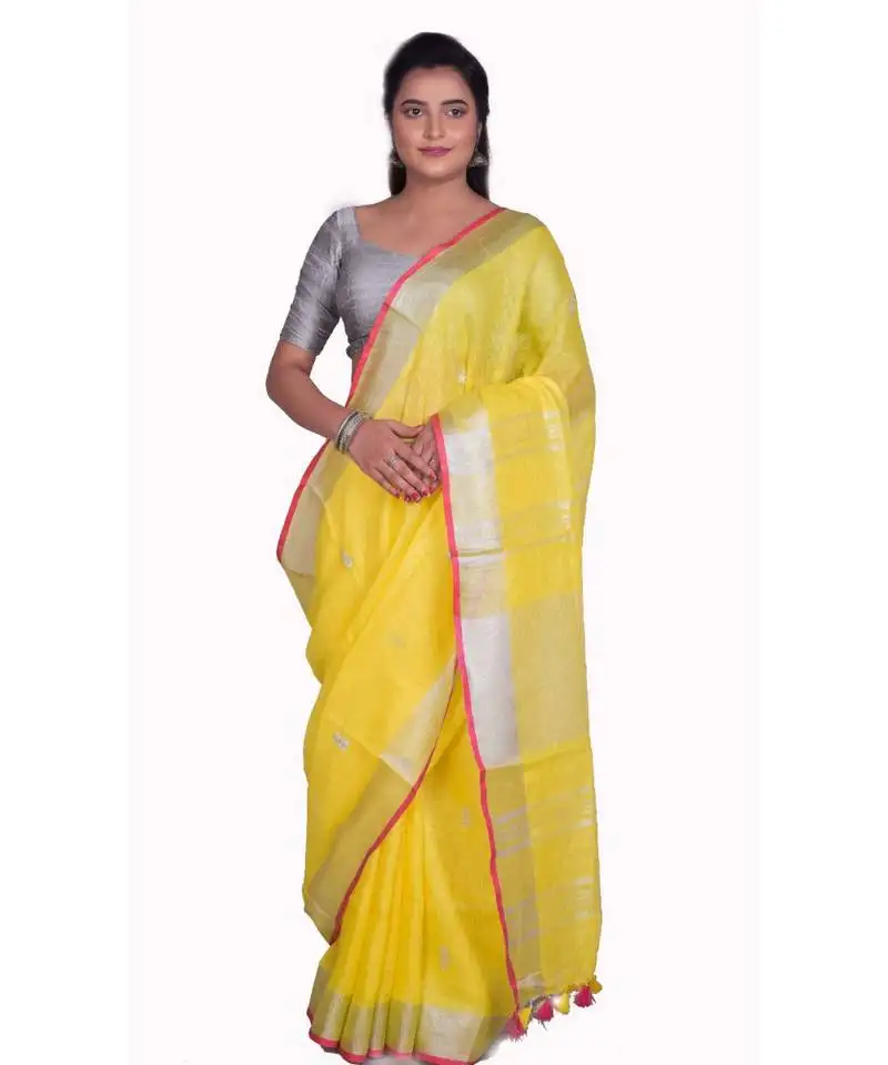 Handcrafted yellow linen saree with silver zari border and beautiful embroidery work