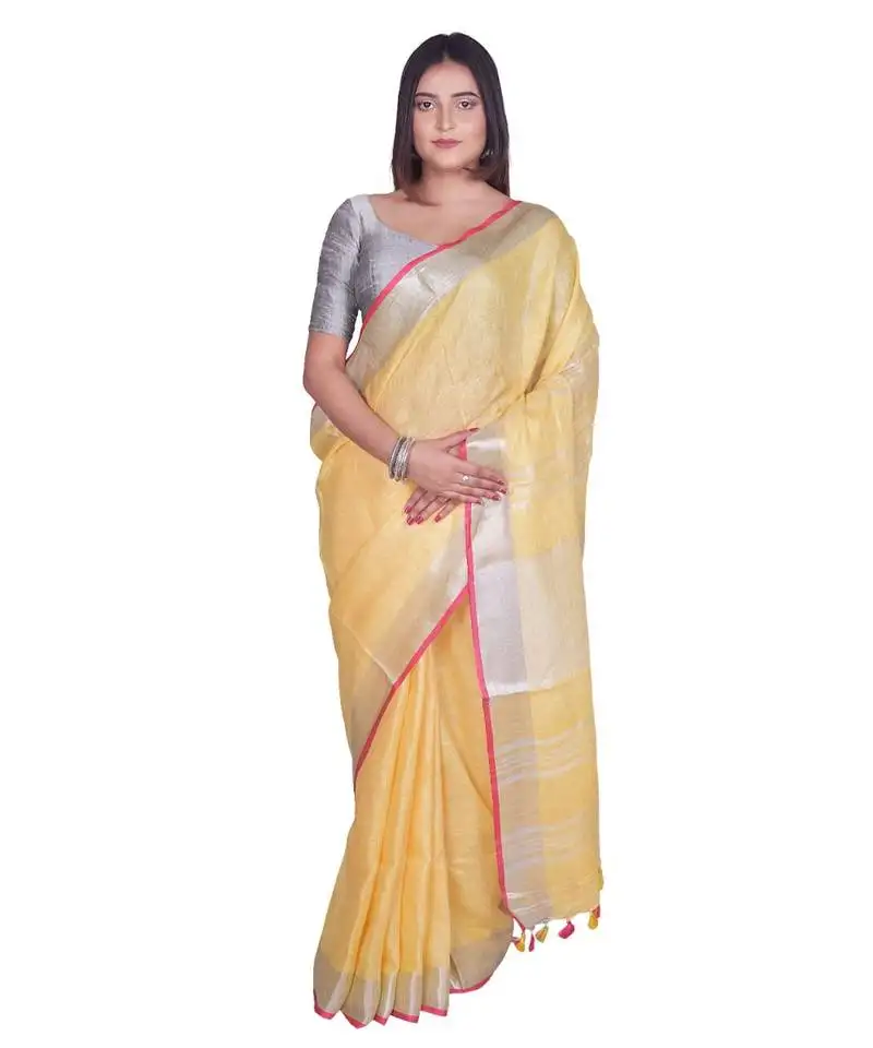 Handcrafted yellow linen saree with silver zari border