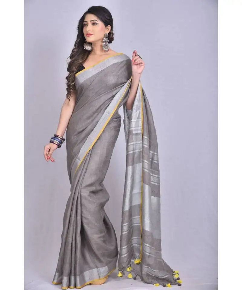 Grey linen saree with blouse with zari border